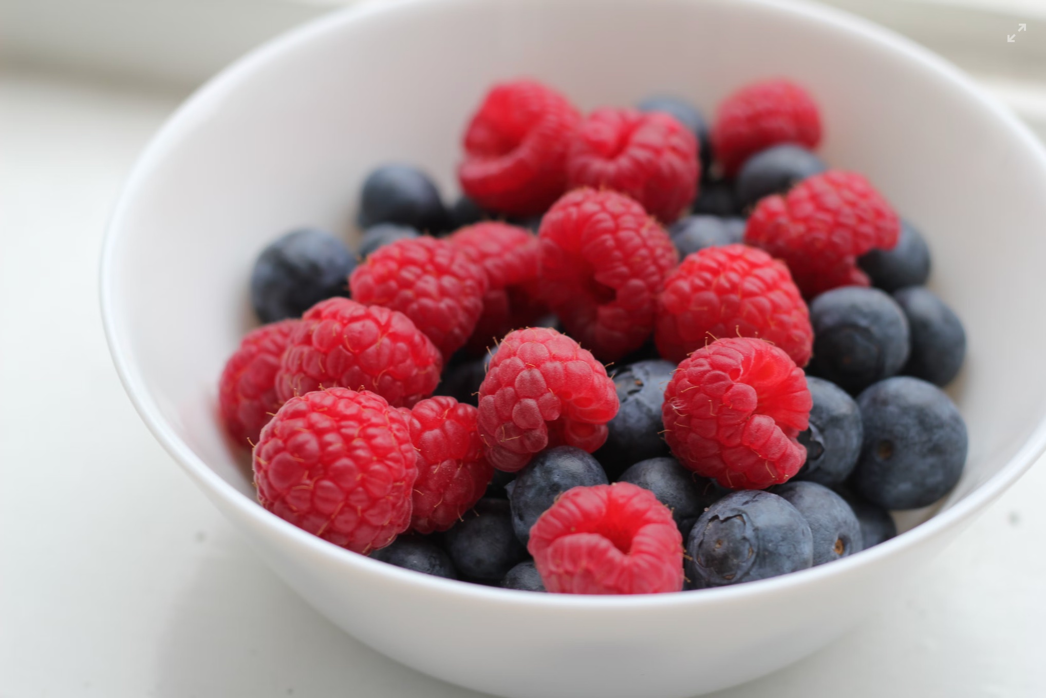 A bowl of berries, PMS-friendly foods
